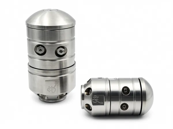 Top down view of rotor nozzle highlighting inlet connection ports and mounting interface for industrial spray equipment.