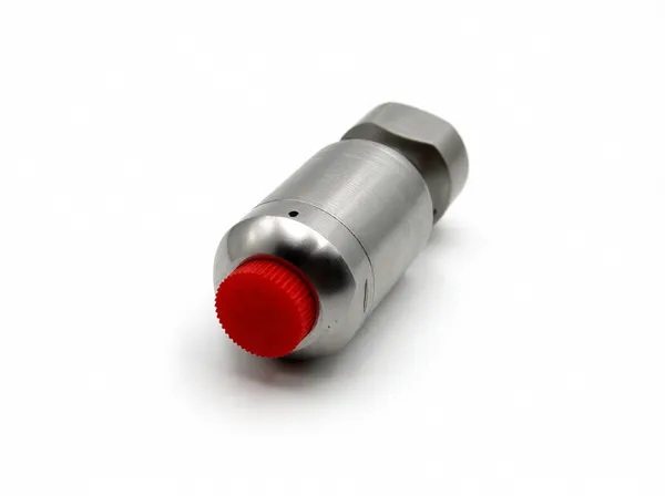 Close-up view of air guide nozzle showing inlet and outlet ports with machined finish details for assembly inspection.