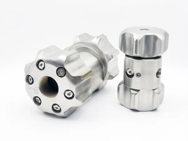 Side profile view of beater nozzle assembly highlighting connection ports and robust construction suitable for heavy dut