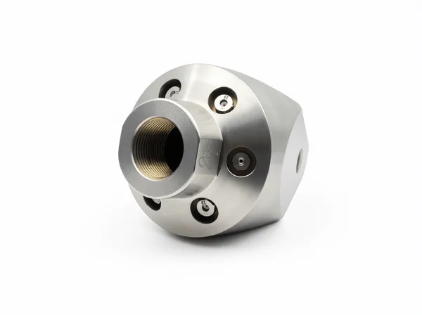 Close-up detail of the cutting tip and internal flow channel mechanism.